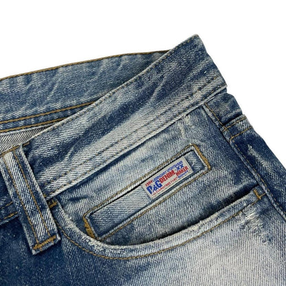 Dolce & Gabbana blue straight jeans mid wash with logo patch and slim fit design.