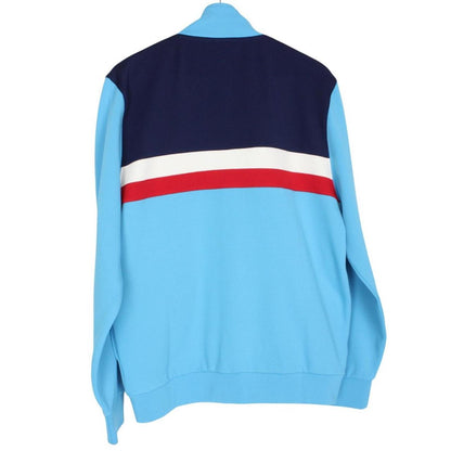 Fila blue track jacket with white stripes and embroidered logo on chest.