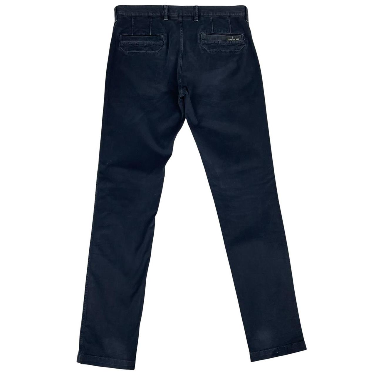 Stone Island navy blue slim fit cotton trousers with logo patch and clean design.