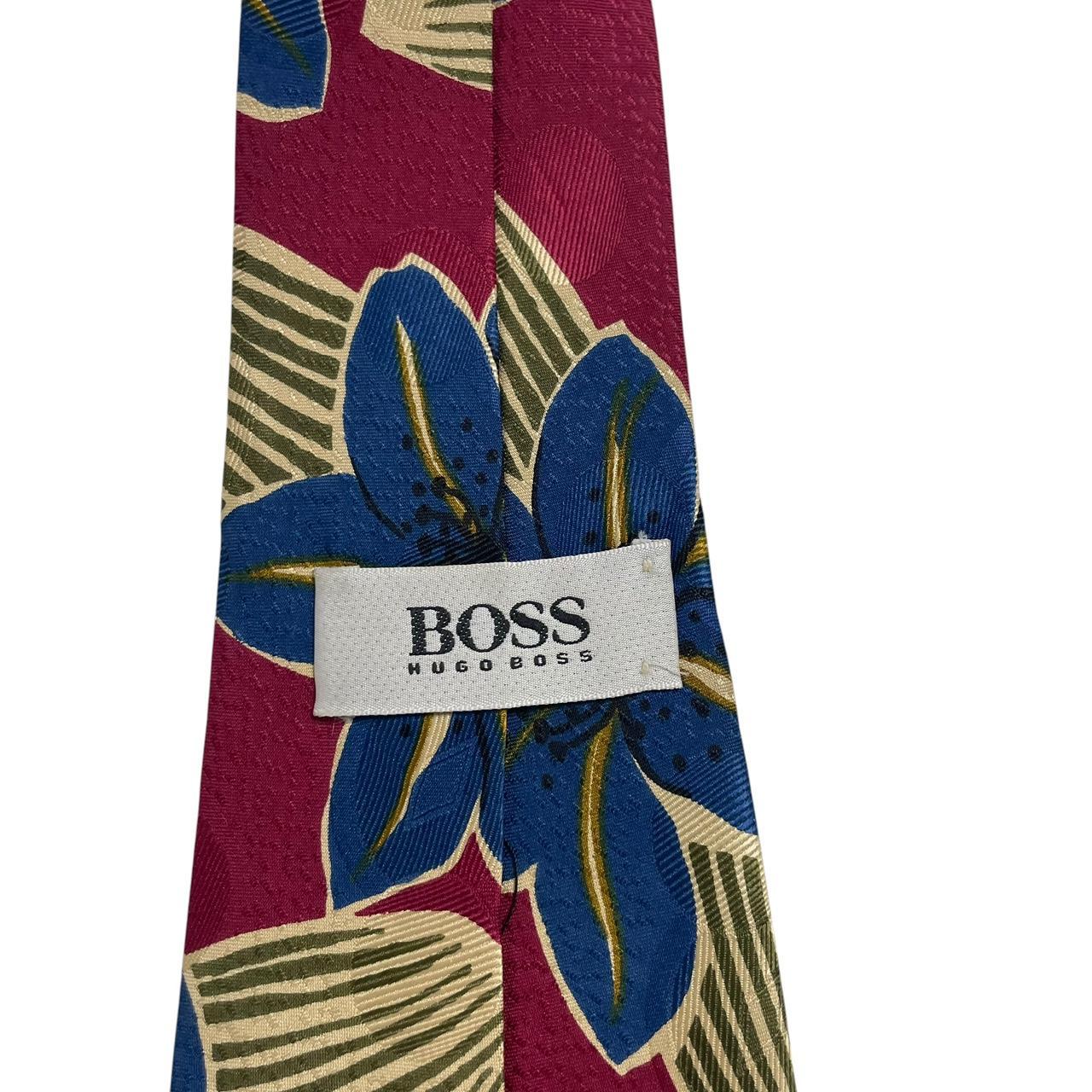 Hugo Boss cream multicoloured floral print silk tie with vibrant patterns and smooth texture.