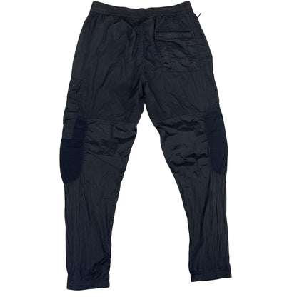 Stone Island black cargo trousers with logo patch and nylon material, size W33.
