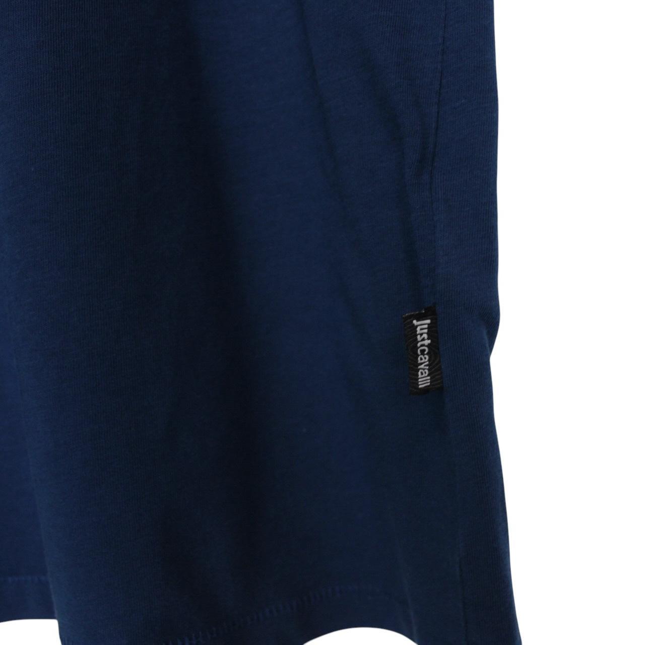 Just Cavalli blue pocket t-shirt with snake print design and cotton material.