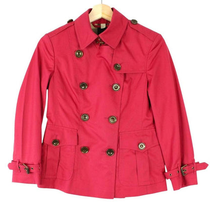 Burberry pink double breasted jacket with Nova Check pattern and logo detail.