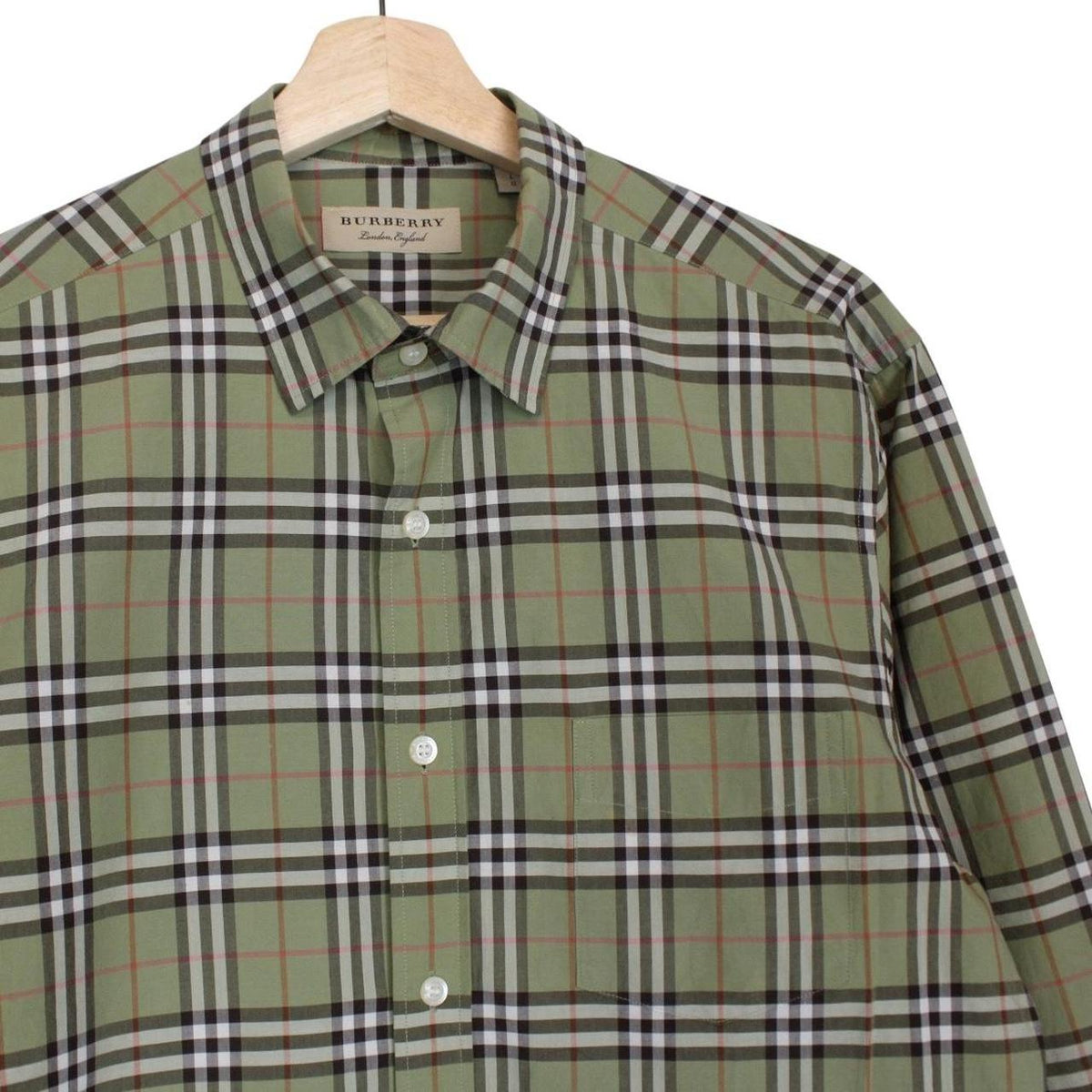 Burberry green long sleeve shirt with Nova Check pattern and cotton poplin material.
