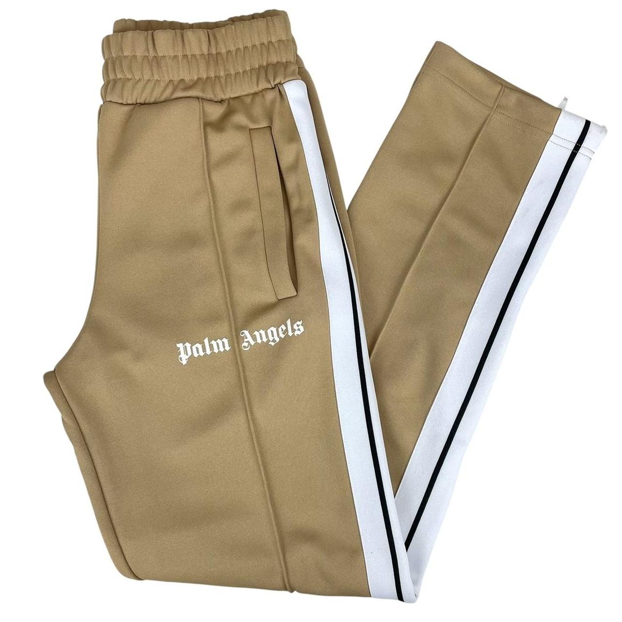 Palm Angels beige and white joggers with logo detail and classic design.