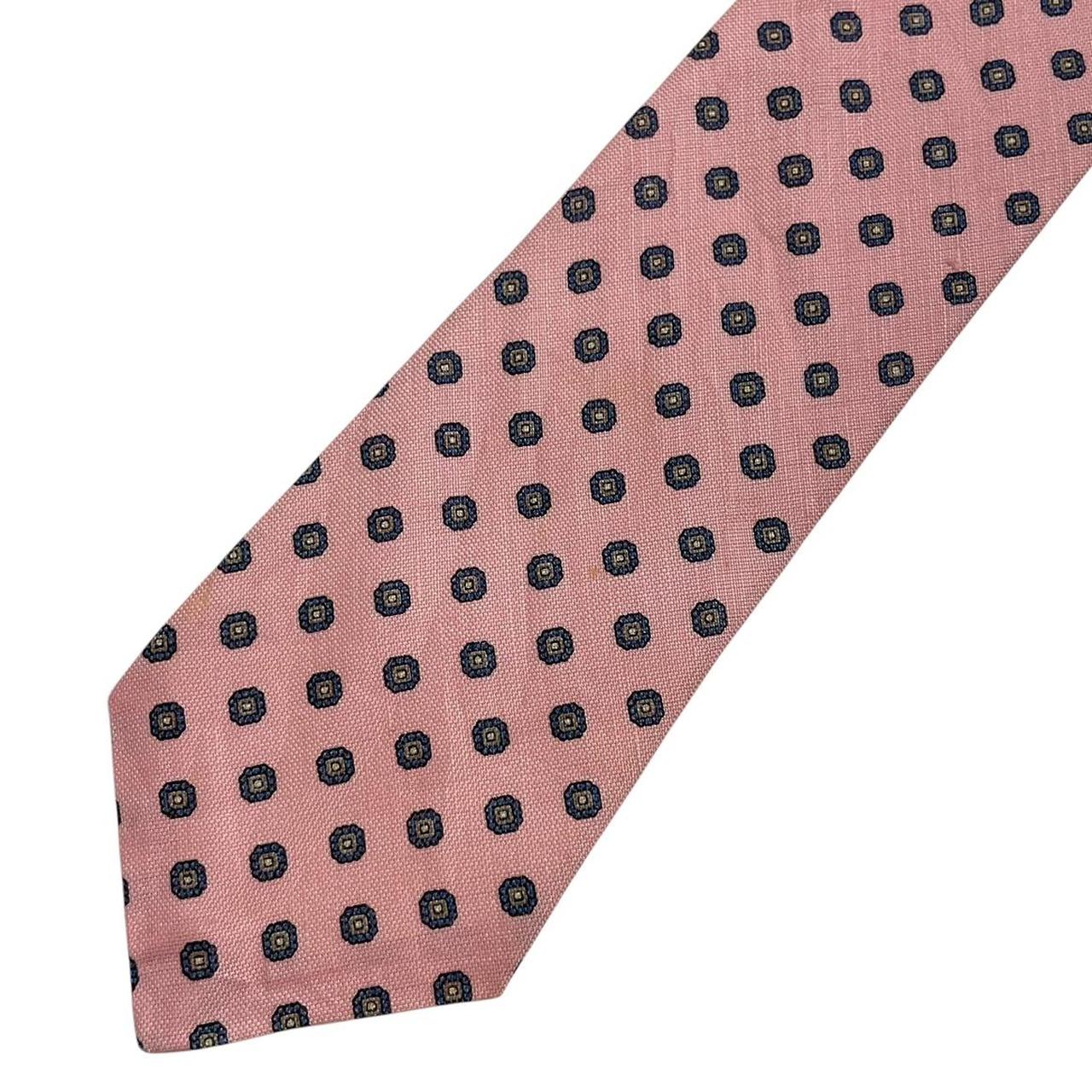Lanvin pink silk tie with geometric print and logo detail.