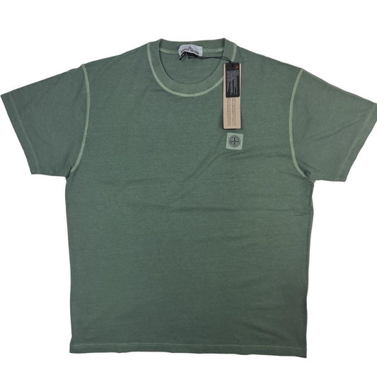 Stone Island green pocket t-shirt with compass logo and fissato effect cotton texture.