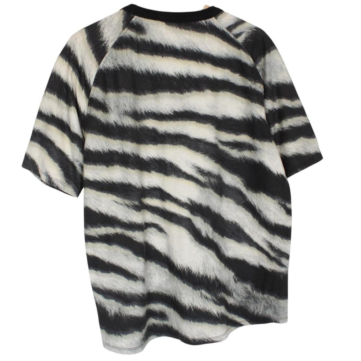 Stone Island short sleeve t-shirt in tiger camo pattern with logo patch on sleeve.