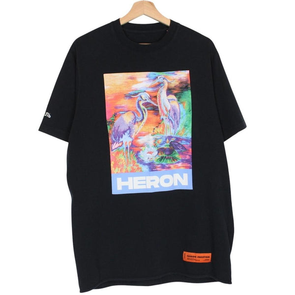 Heron Preston black pocket t-shirt with multicoloured birds print and oversized fit.