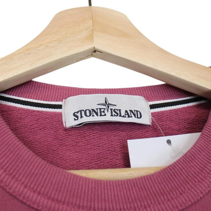 Stone Island mauve cotton sweatshirt with embroidered compass logo and ribbed cuffs.