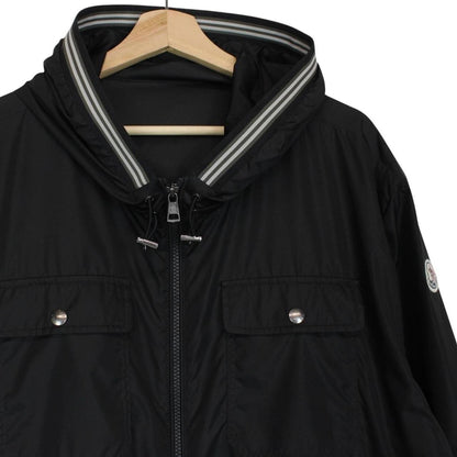 Moncler black windbreaker jacket full zip nylon with logo detail and excellent condition.