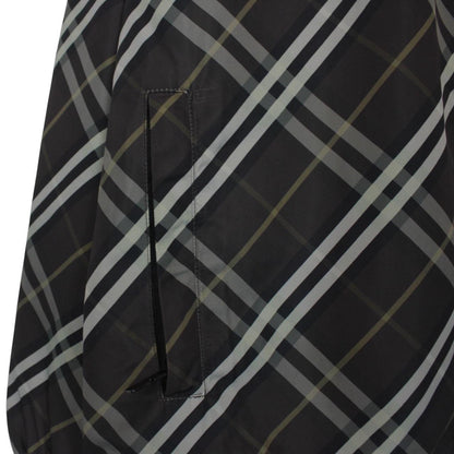 Burberry reversible jacket in dark grey and black with Nova Check pattern and full zip.