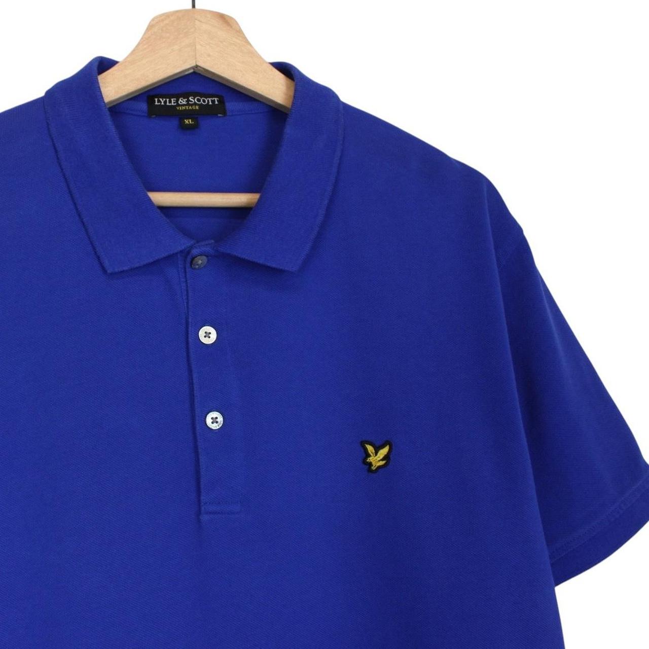 Lyle & Scott blue short sleeve polo shirt with embroidered logo and cotton material.