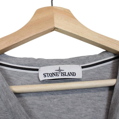 Stone Island grey short sleeve t-shirt with reflective logo and cotton material.