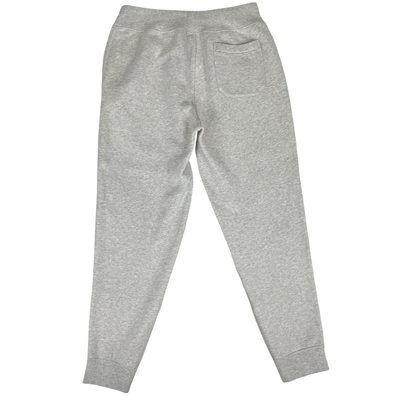 Polo Ralph Lauren grey joggers with embroidered logo and soft cotton material.