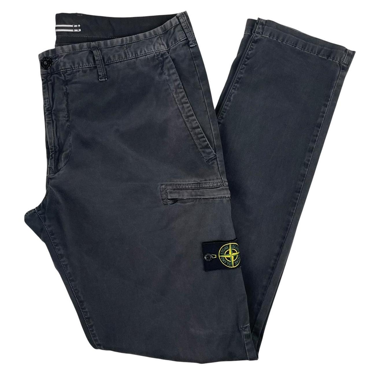 Stone Island black skinny fit cargo trousers with logo patch and multiple pockets.