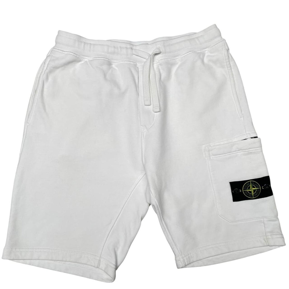 Stone Island white jogger shorts with logo patch and cotton material.