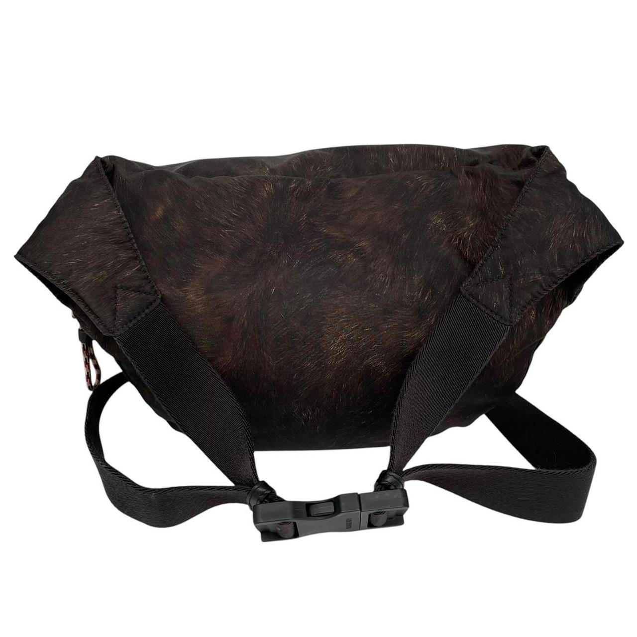 Burberry brown and black convertible bum bag with ape logo and durable material.