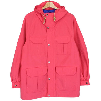 Gucci pink windbreaker jacket with North Face logo and full zip design.