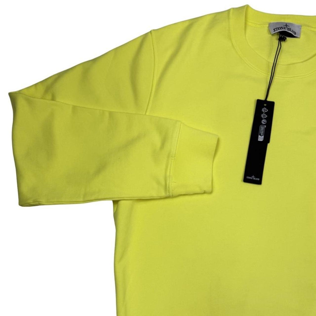 Stone Island yellow sweatshirt made from organic cotton with logo patch on sleeve.