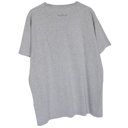 Stone Island grey short sleeve t-shirt with reflective logo and cotton material.