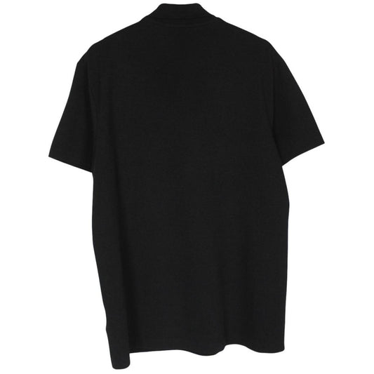 Lacoste black short sleeve polo shirt with embroidered crocodile logo, made of cotton.