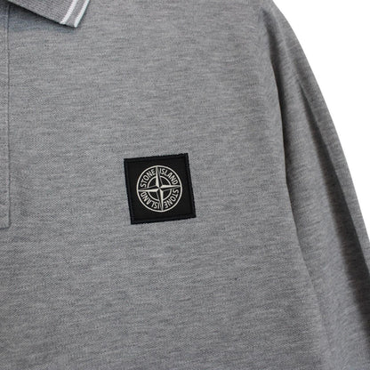 Stone Island grey long sleeve polo shirt with embroidered compass logo and slim fit.