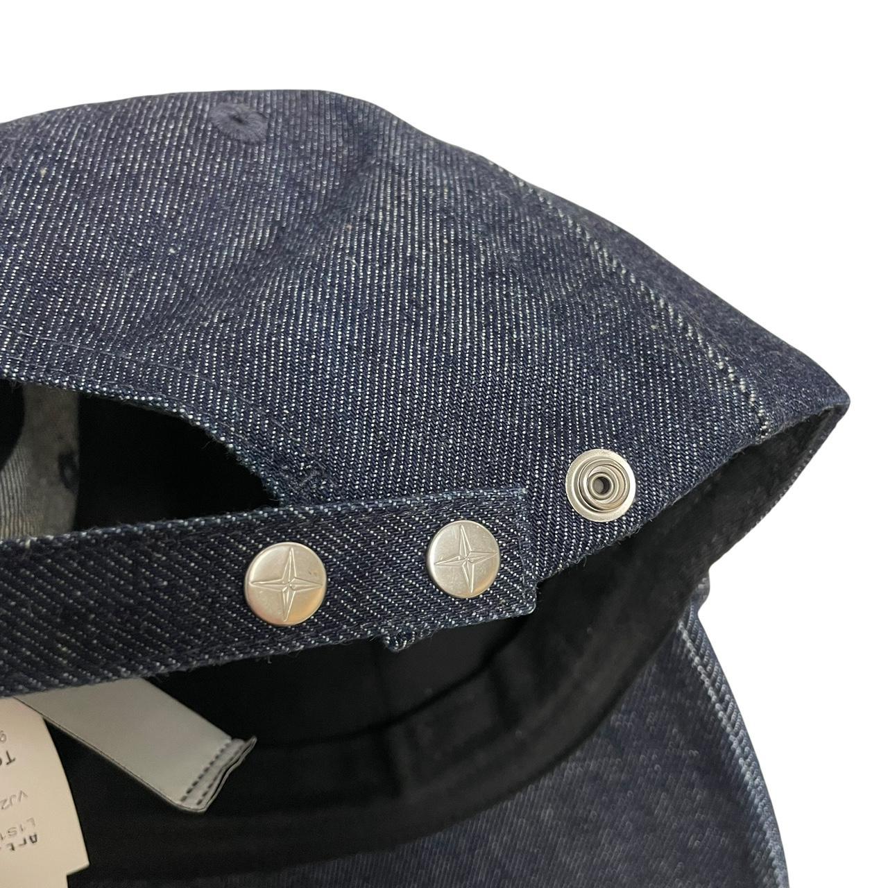 Stone Island blue denim baseball cap with diagonal twill texture and logo patch.