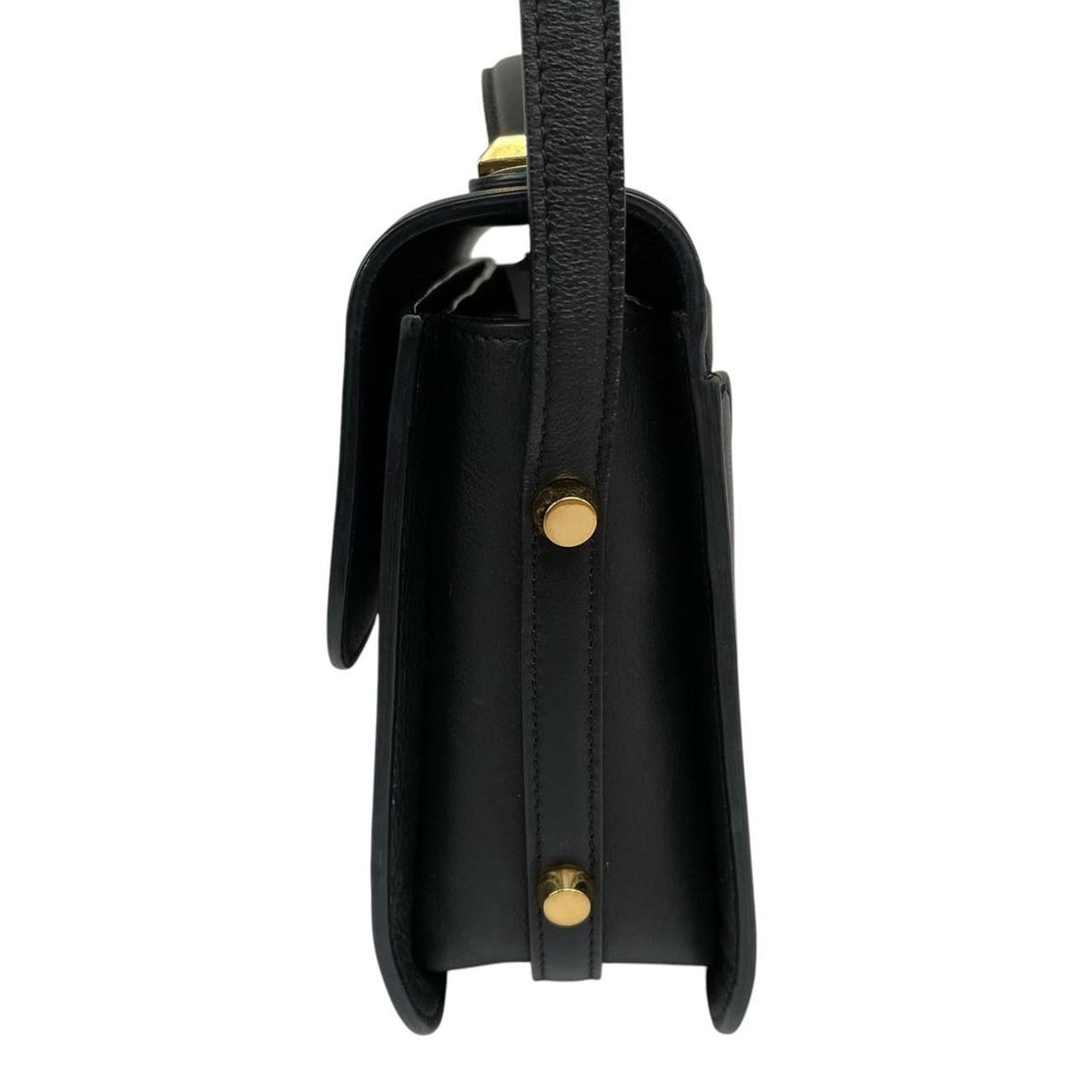 Alexander McQueen black and gold leather messenger bag with logo detailing and faint scratches.