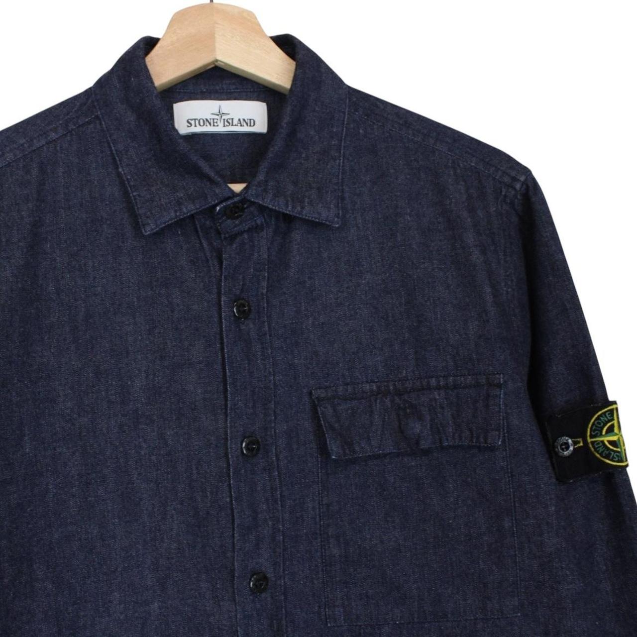 Stone Island navy blue denim overshirt with logo patch and button-up front.