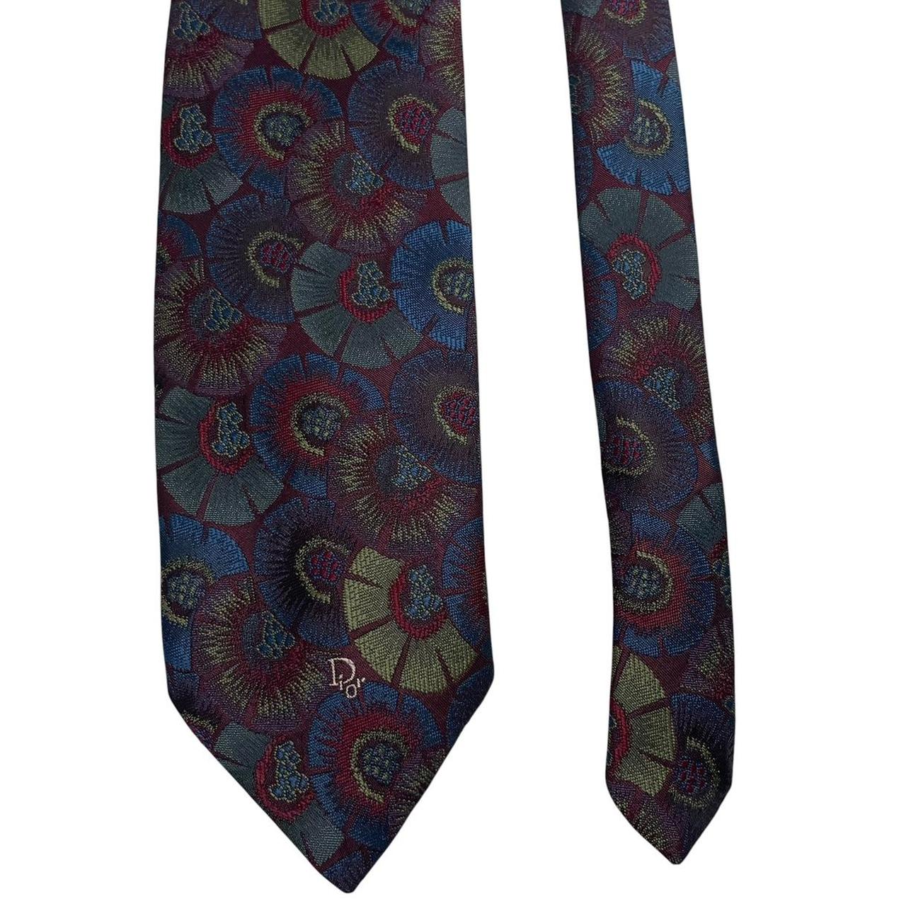 Christian Dior multicoloured tie featuring intricate patterns in silk and polyester.