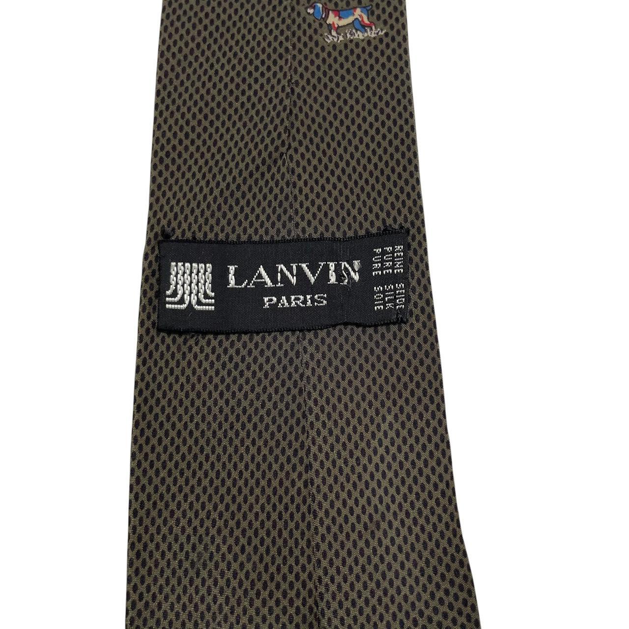 Lanvin green silk tie featuring playful dog print design.