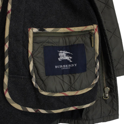 Burberry khaki green quilted field jacket with Nova Check pattern and logo details.