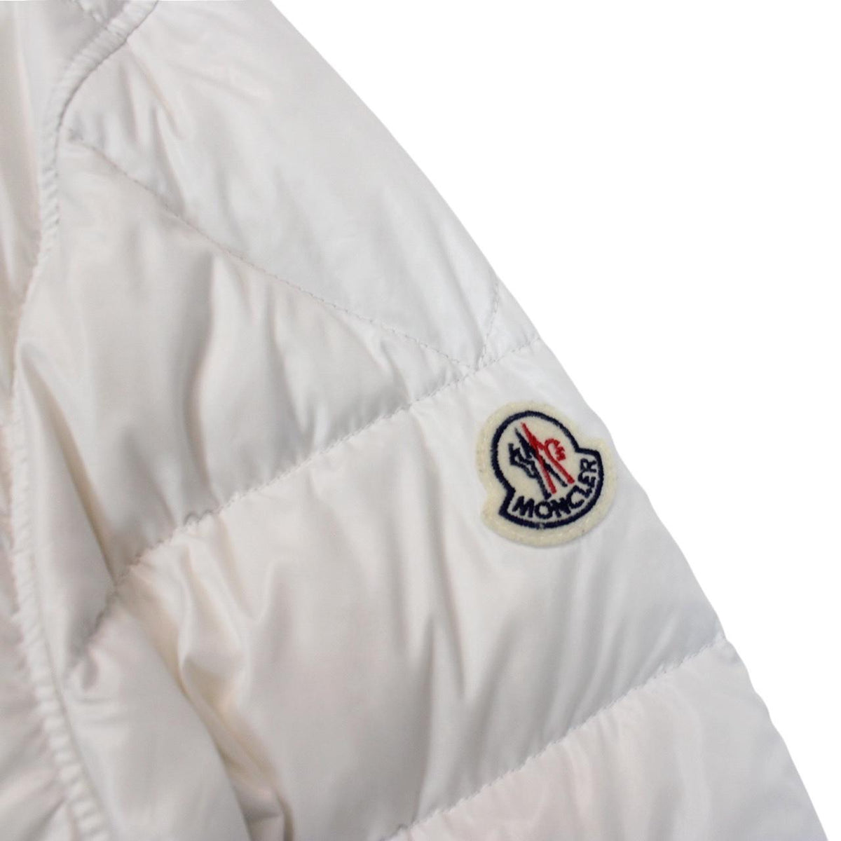 Moncler white and silver reversible down jacket with full zip and hood.