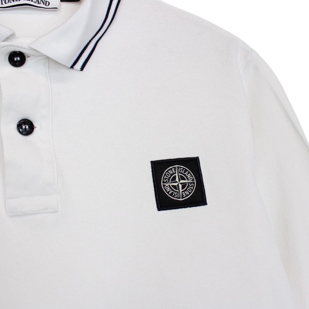 Stone Island white long sleeve polo shirt with compass logo and slim fit design.
