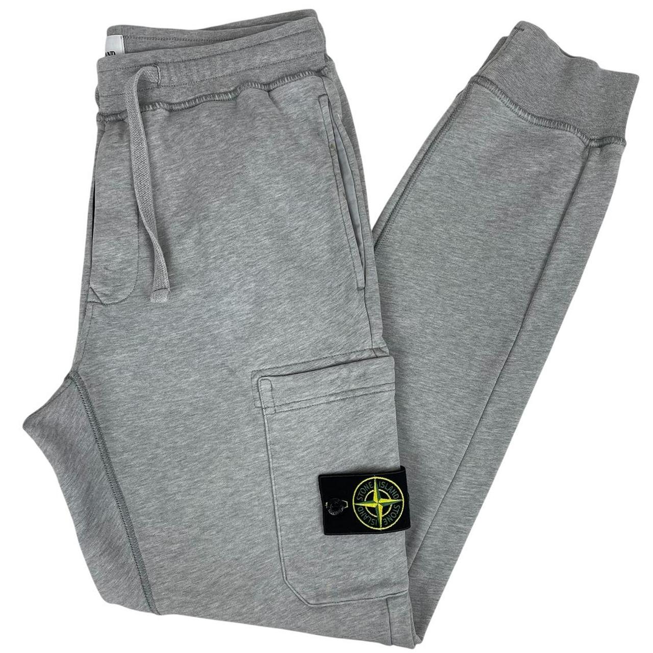 Stone Island grey joggers with logo patch and cotton material, size small.