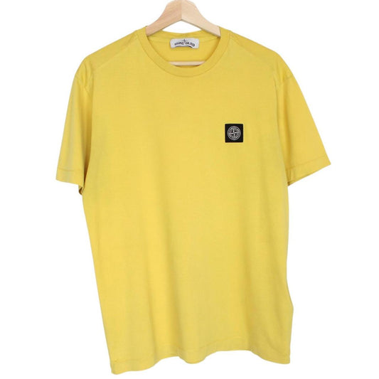 Stone Island yellow short sleeve cotton t-shirt with compass logo and soft fabric.