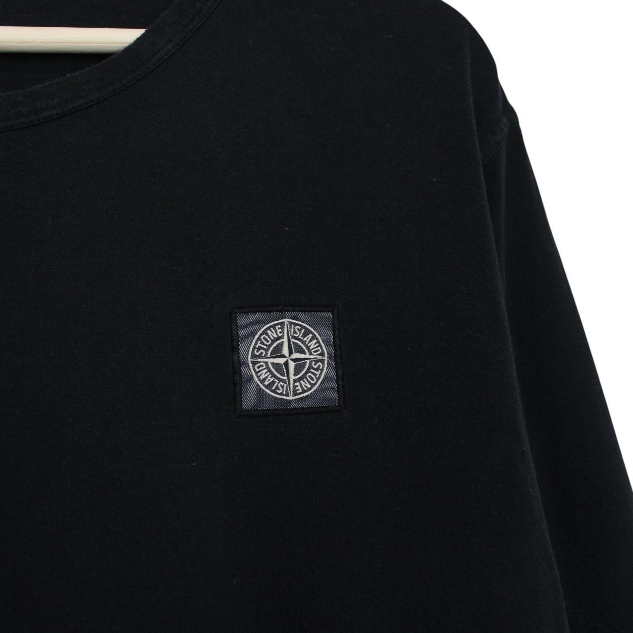 Stone Island black long sleeve t-shirt with compass logo and pocket detail.