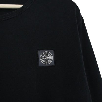 Stone Island black long sleeve t-shirt with compass logo and pocket detail.