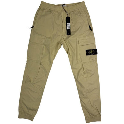 Stone Island beige cargo trousers with logo patch and stretch cotton material.