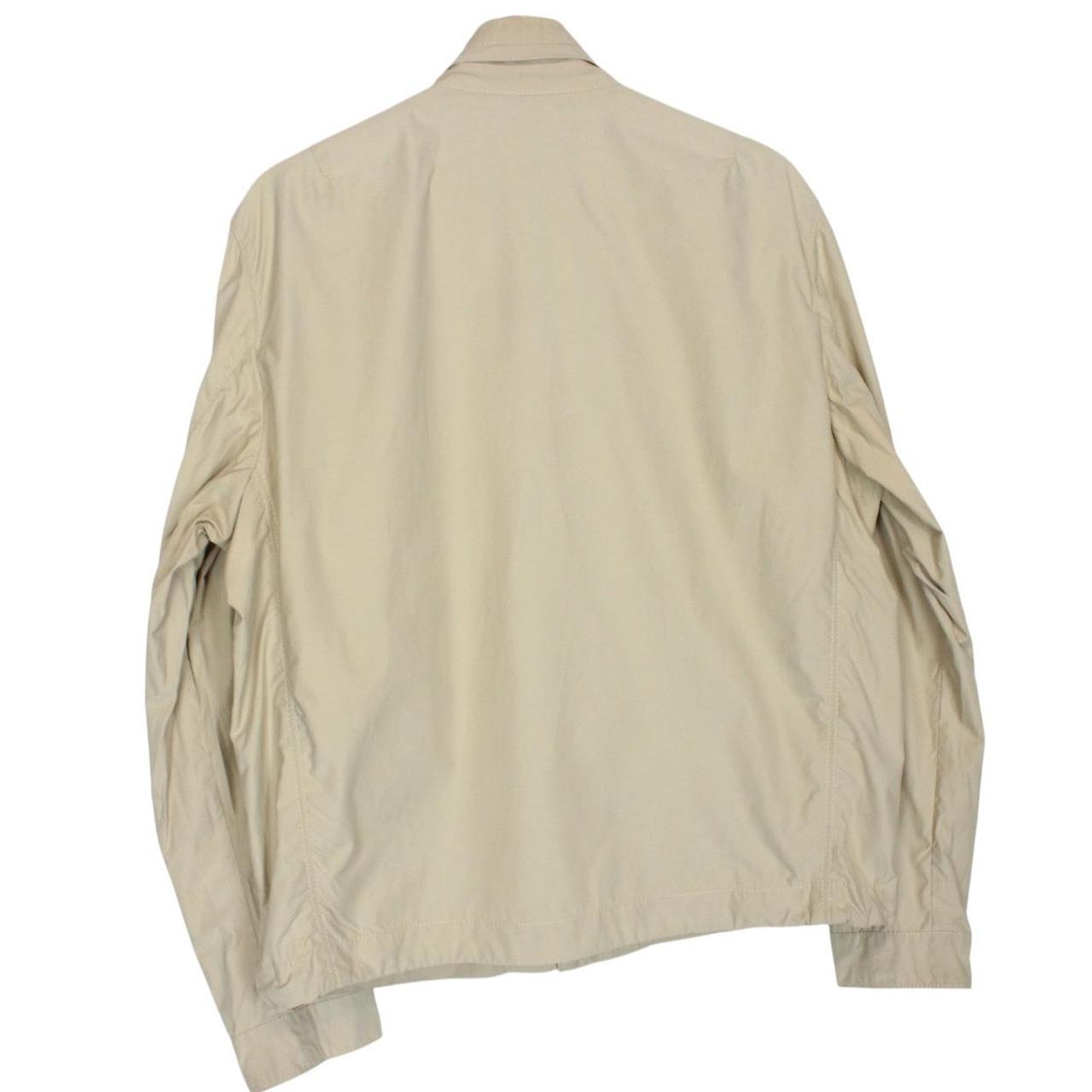 Burberry beige windbreaker jacket with full zip, logo detail, and nylon material.