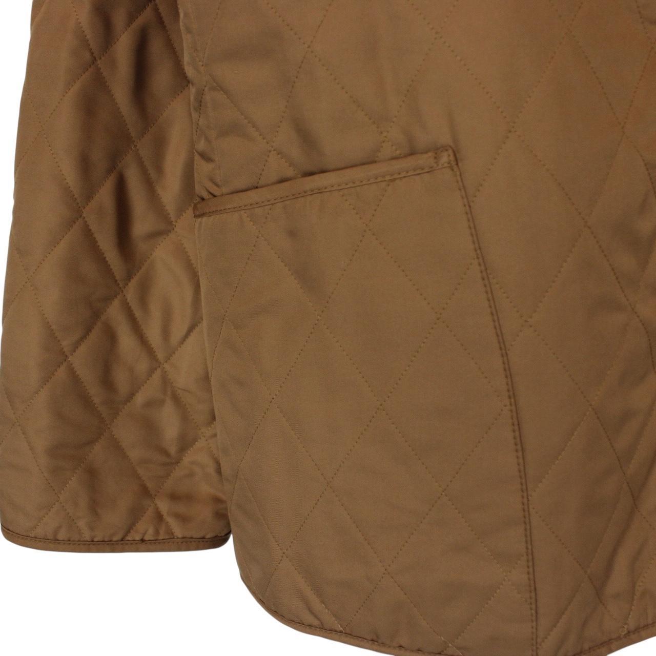 Burberry tan brown diamond quilted jacket with Nova Check lining and logo detail.