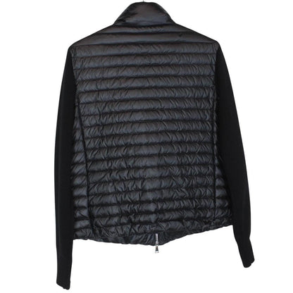Moncler black cardigan jacket with full zip, down tricot material, and logo detail.