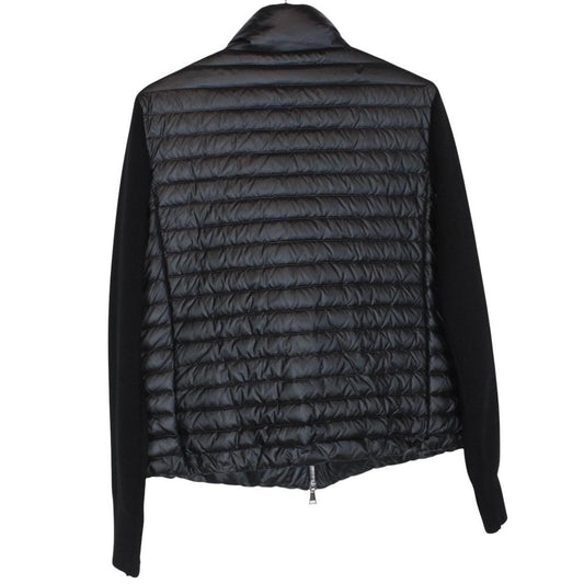 Moncler black cardigan jacket with full zip, down tricot material, and logo detail.