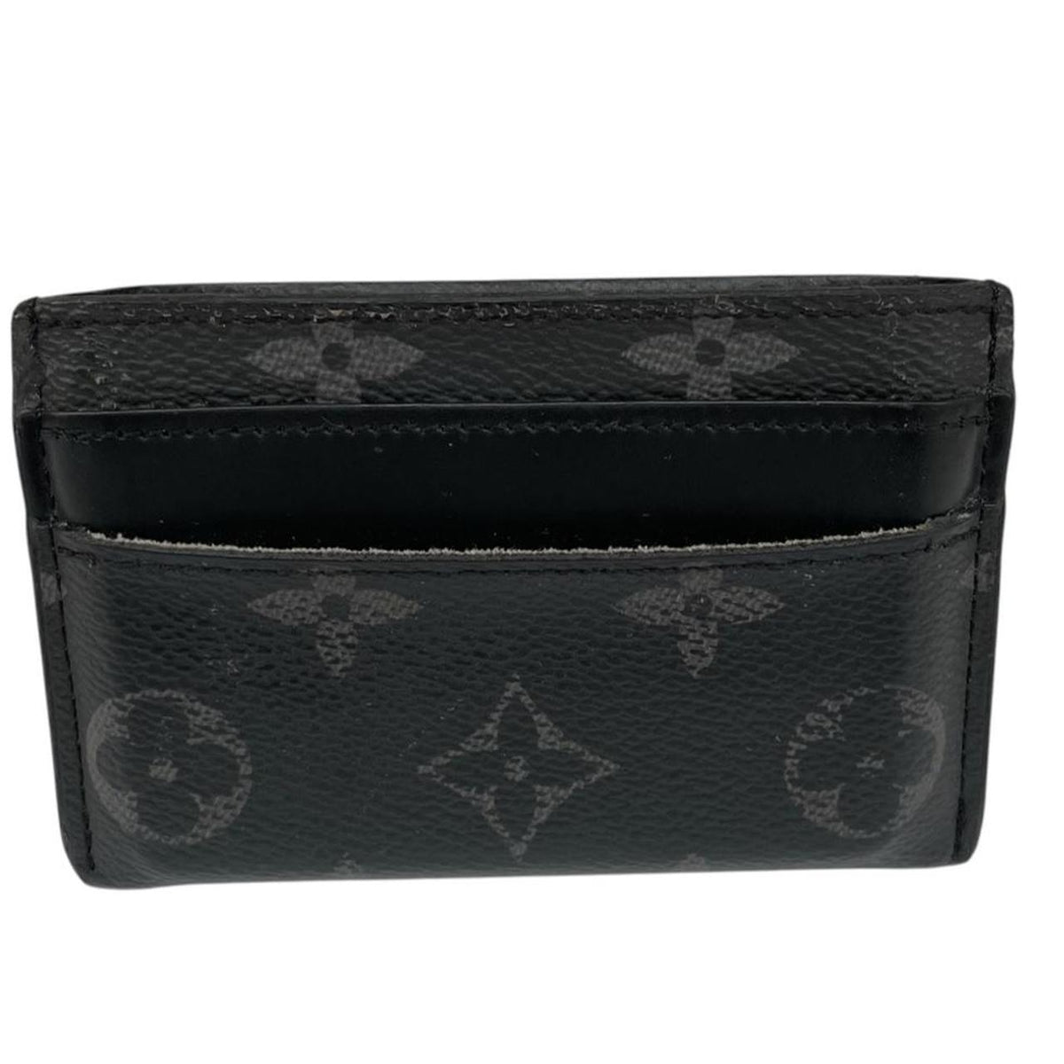 Louis Vuitton black and grey coated canvas double card holder with monogram pattern.