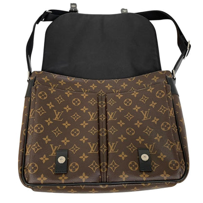 Louis Vuitton brown canvas messenger bag with monogram pattern and silver hardware.