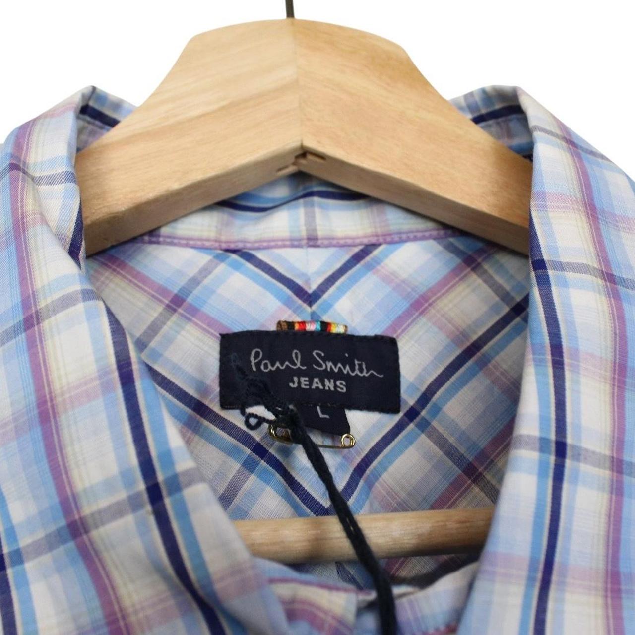 Paul Smith multicoloured check short sleeve cotton shirt with brand logo and vibrant patterns.