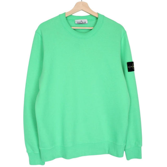 Stone Island green cotton sweatshirt with iconic compass logo and ribbed cuffs.