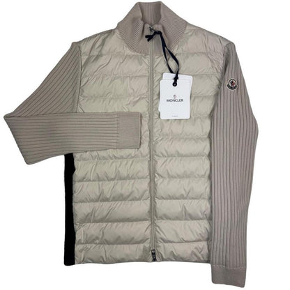 Moncler beige full zip jacket with logo detail and nylon/wool blend material.