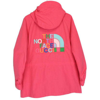 Gucci pink windbreaker jacket with North Face logo and full zip design.